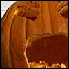 Thumnail of a larger image of a pumpkin, erm, puking its guts out. Literally......