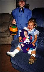 Slightly different image of my three daughters dressed up in costumes