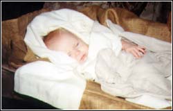 Bethany Grace Newhouse, asleep in the manger at church.