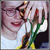 Thumbnail image of Jordan holding homemade slime at her birthday party